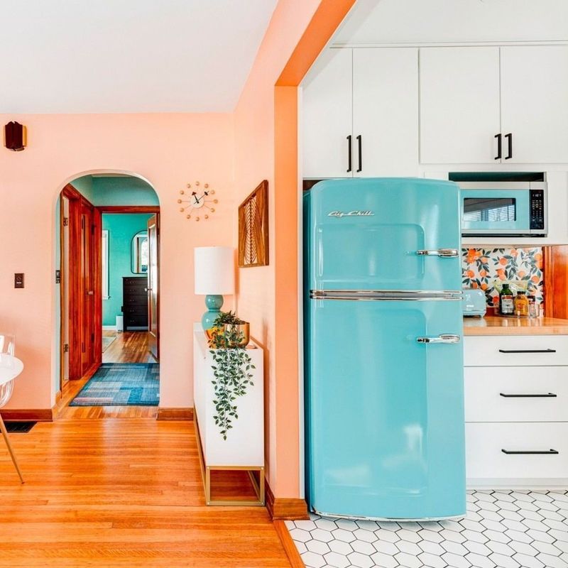 Retro Teal Appliances Framed by Copper Trim