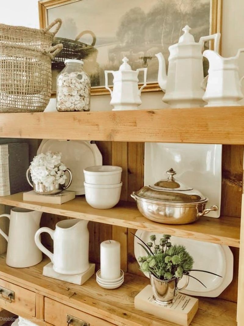 Antique Teapots On Open Shelving