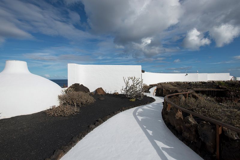 Modernist House Embedded in Lava Rock