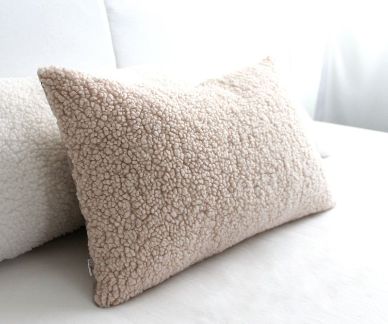 Add Cream Throw Pillows with Varied Fabrics