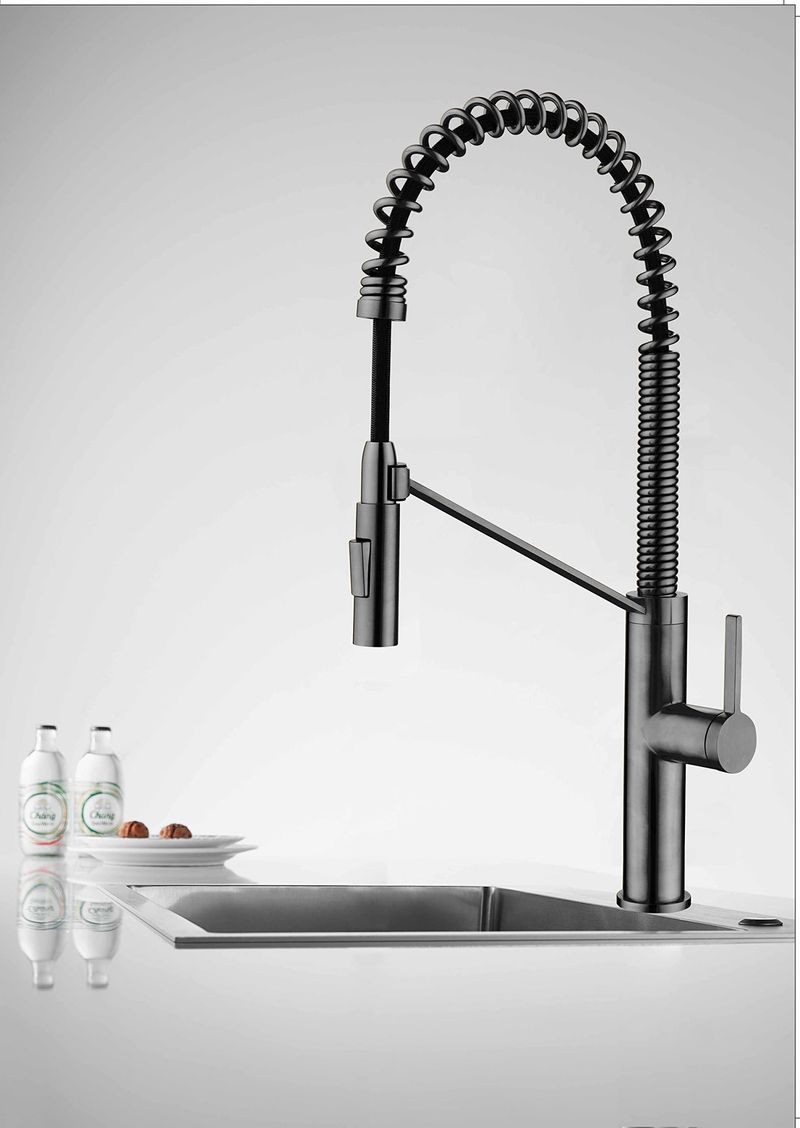 Pull-down faucets with magnetic docking