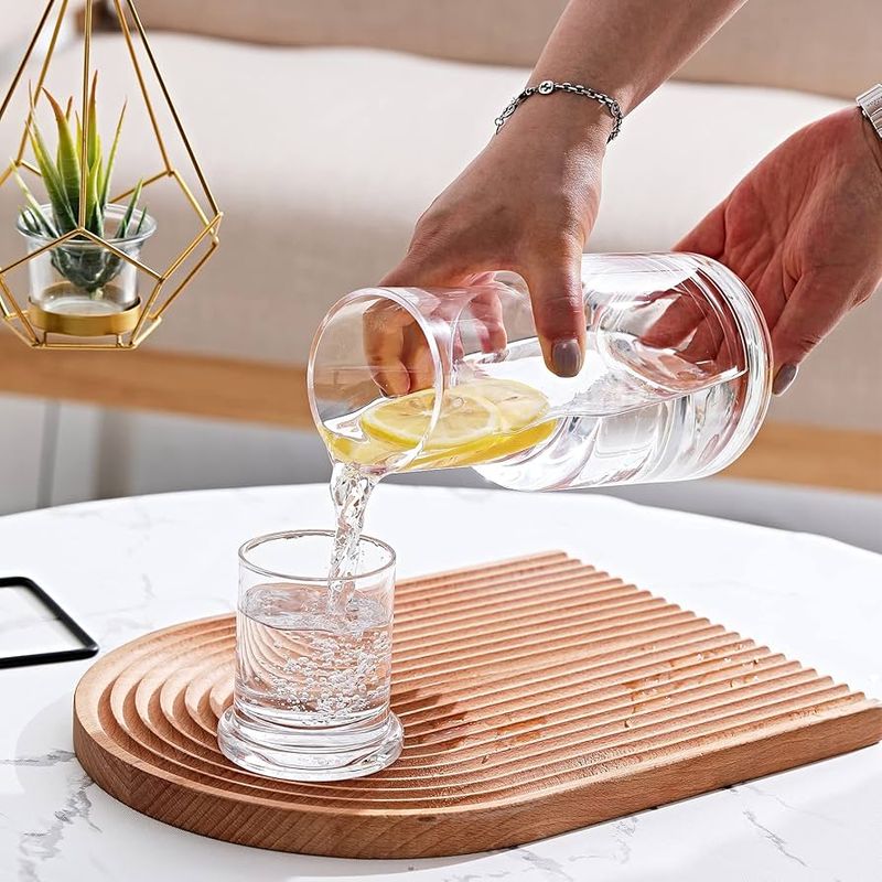 Brought in a Quietly Elegant Carafe and Glass