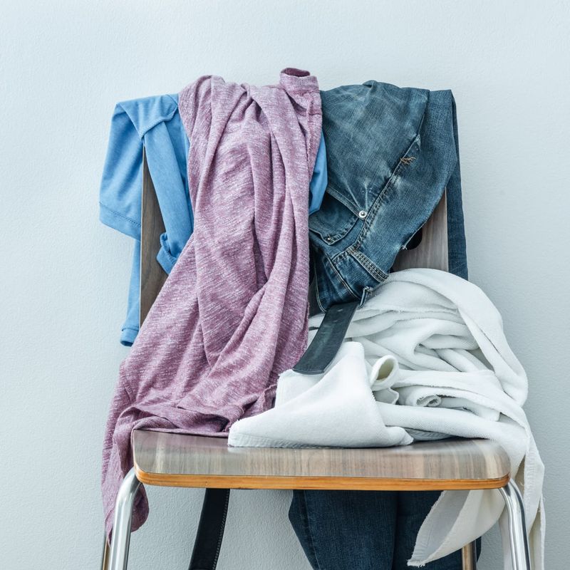 Piling Clothes on Chairs