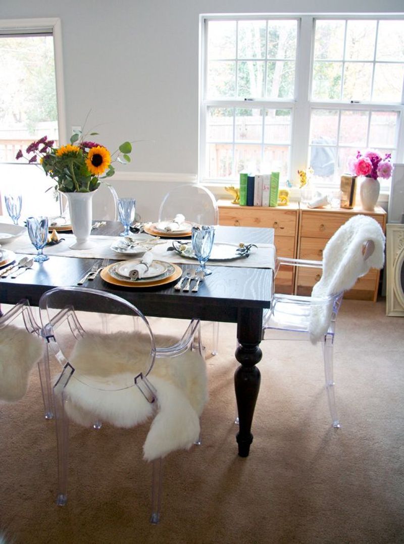 Distressed Painted Chairs and Sleek Lucite Pieces