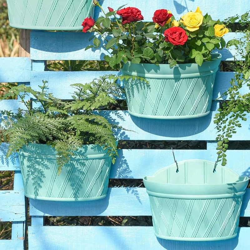 Turquoise Planters Lining a Brick Wall