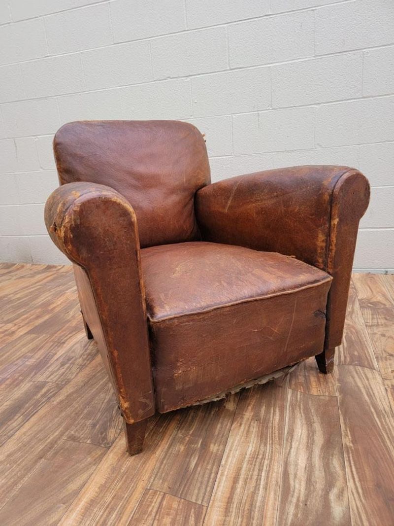 Worn Leather Club Chairs