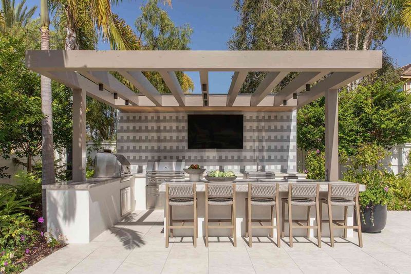 Pergola-Covered Island for Shade and Style