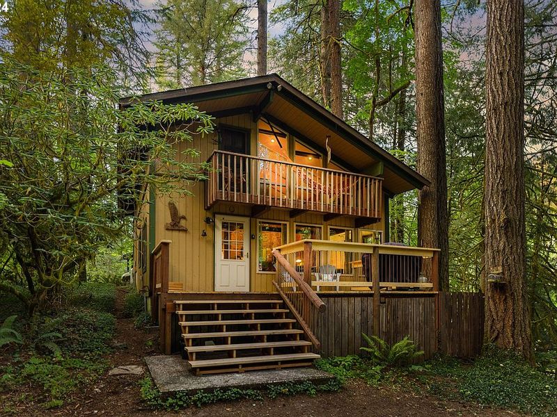 Riverbank Haven Built from Reclaimed Wood