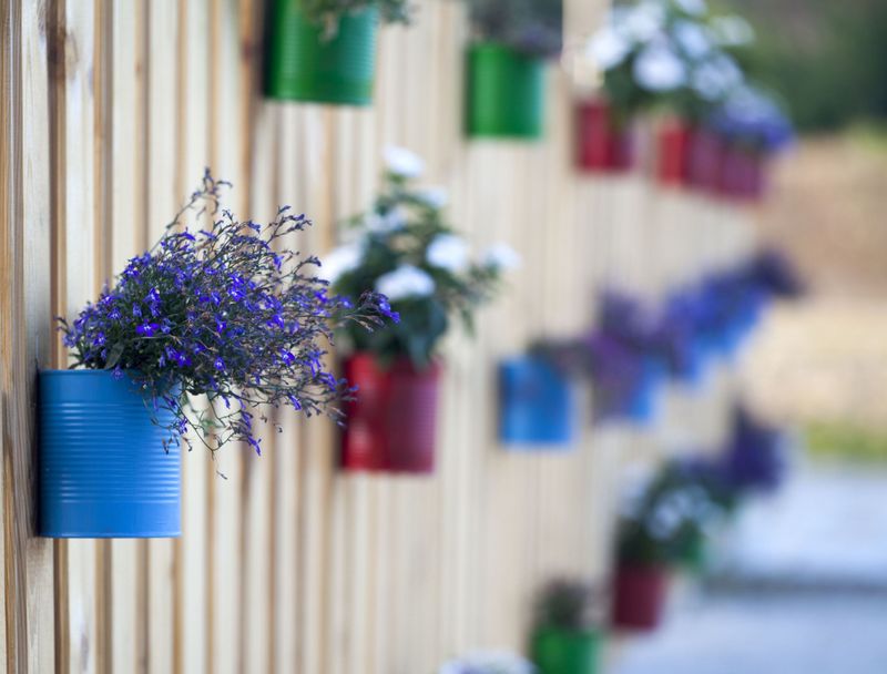 Tin Can Vertical Garden Fence