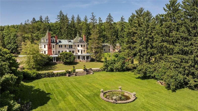 Sweeping Lawn With Classic Fountain