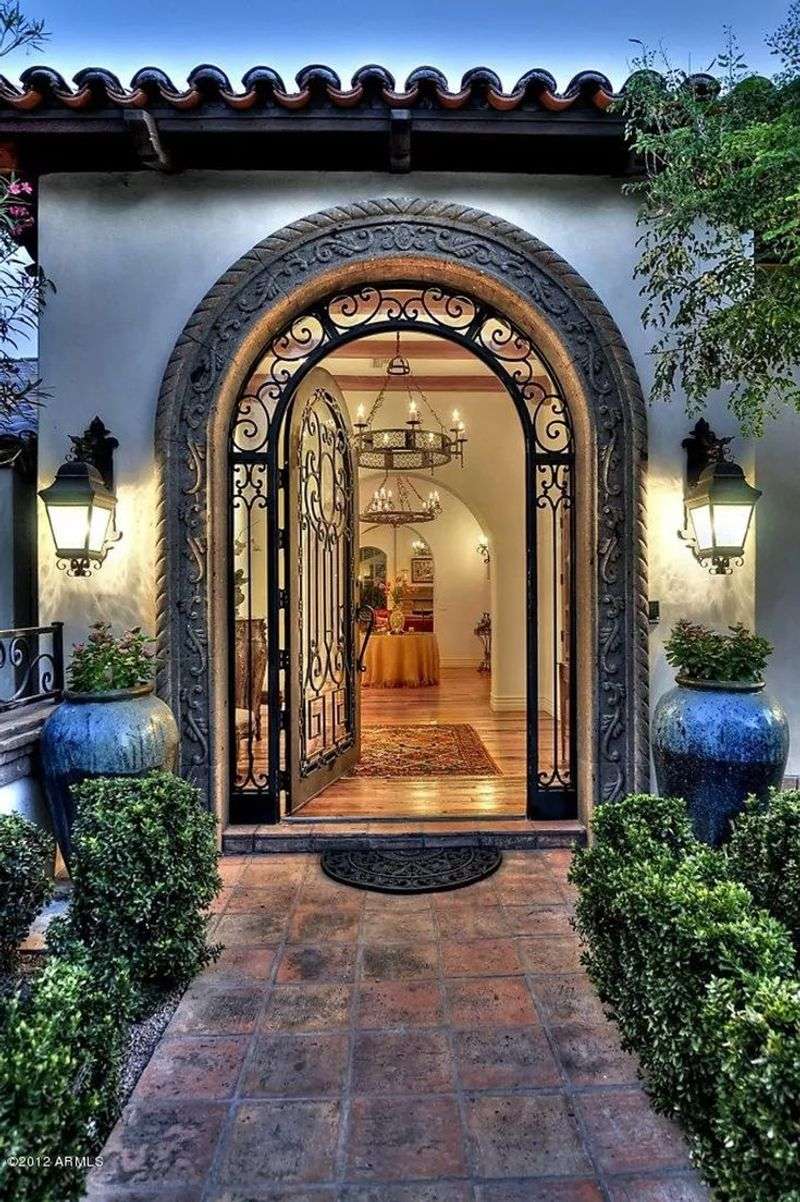 Vestibule with Iron Grille Doors in a Mediterranean Villa