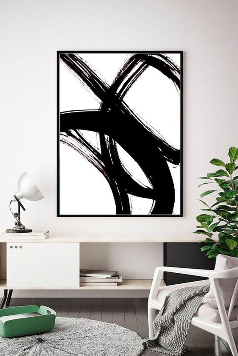 Hang Understated Artwork