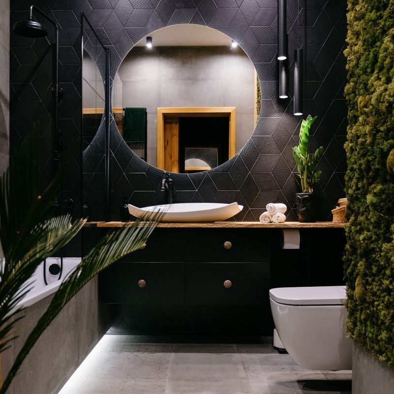 Black Bathroom With Gold Accents