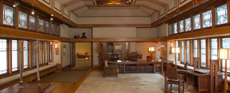 Vestibule with Frosted Pocket Doors in a Prairie-Style House