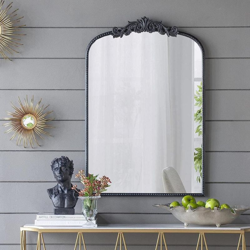 Install a Mirror or Artwork That Swings Open