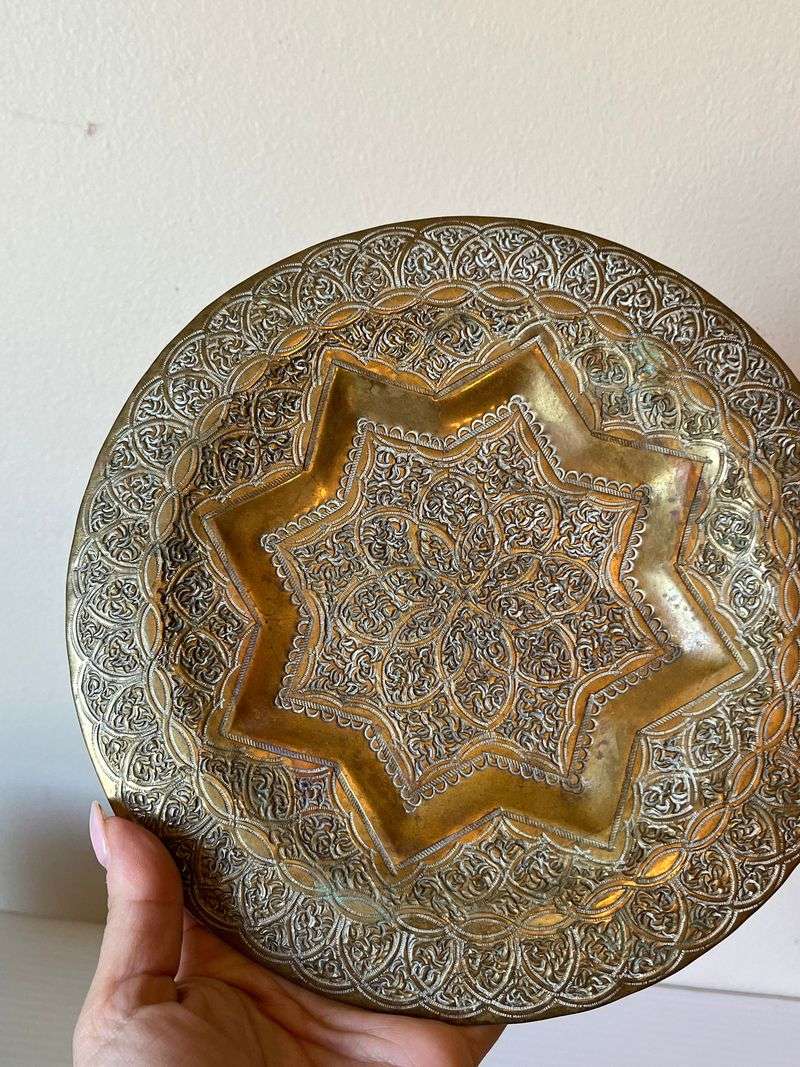 Incorporate brass or copper accessories