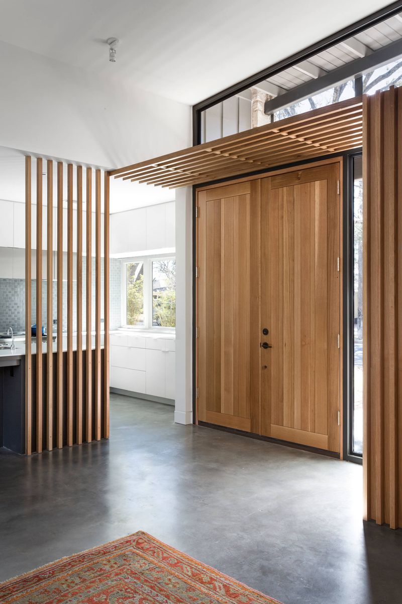 Mid-Century Vestibule with Angular Screens and Planters